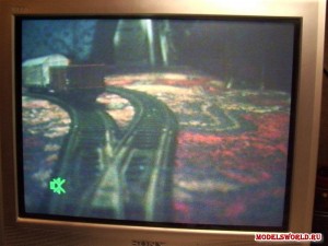 Видеокамера на макете железной дороги.